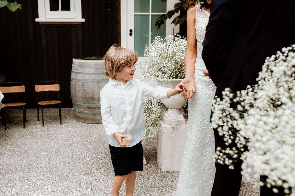Catalina-and-Charles-Wilkinson-Wedding-New-Zealand-Spanish-Inspired-Wild-Folk-Photography-Mudbrick-ring-box Walker and Hall
